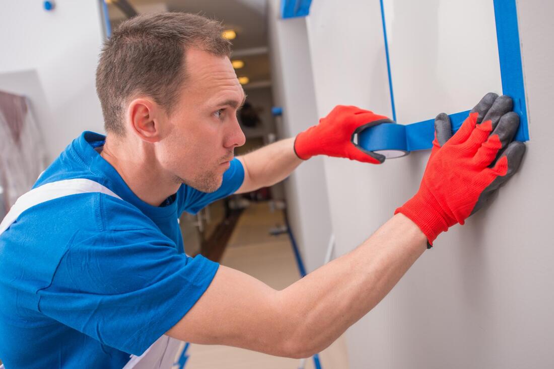 painter working wearing gloves